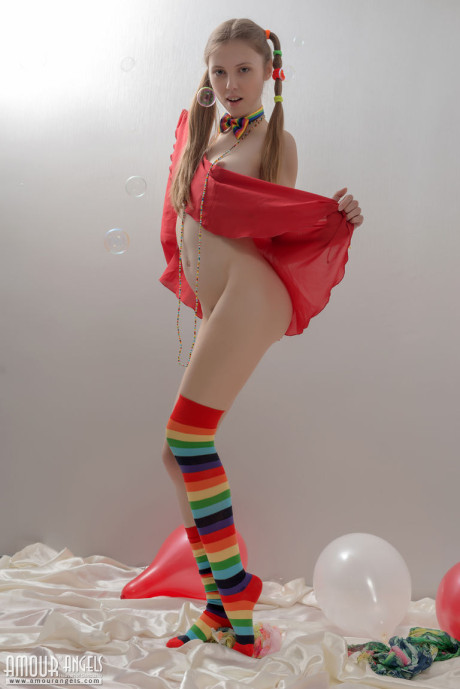 Thin young lady gf chick in pigtails and multi-colored socks takes off her clothes - #2265