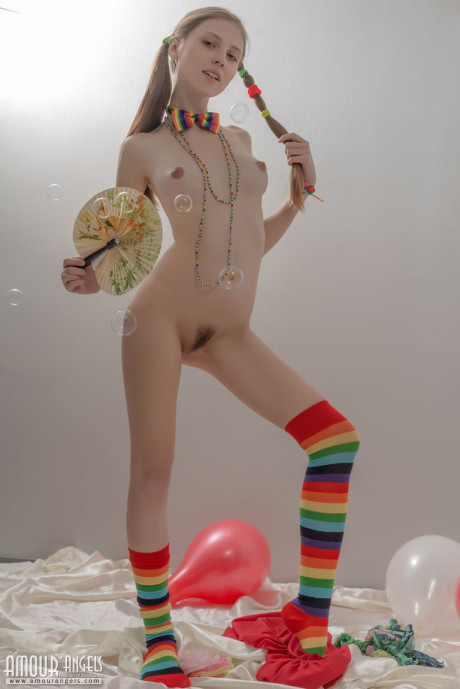 Thin young lady gf chick in pigtails and multi-colored socks takes off her clothes - #2269