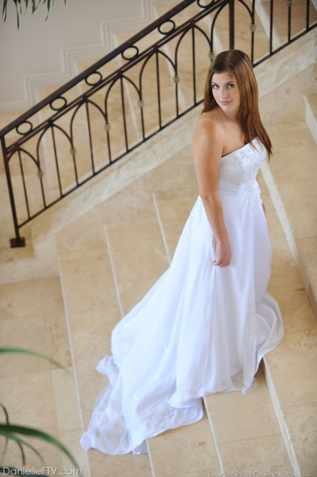 Busty glamorous amateur Danielle models wedding gown indoors & by the pool - #218932
