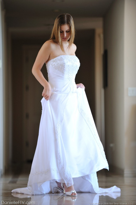 Busty glamorous amateur Danielle models wedding gown indoors & by the pool - #218936
