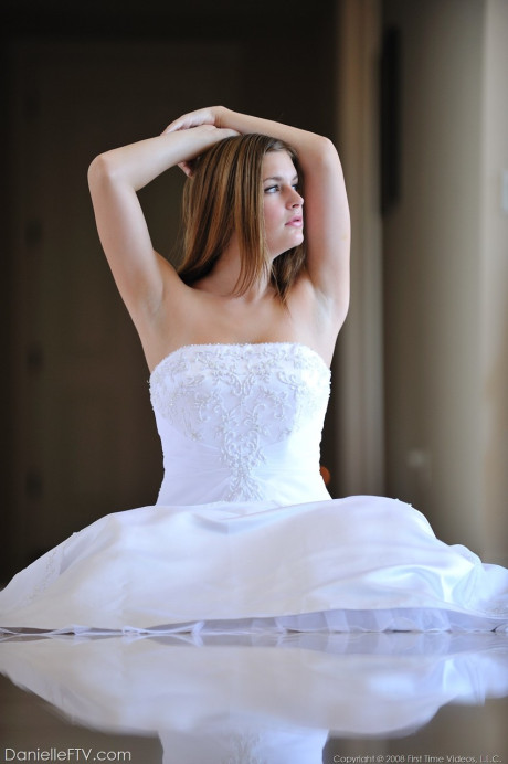 Busty glamorous amateur Danielle models wedding gown indoors & by the pool - #218937