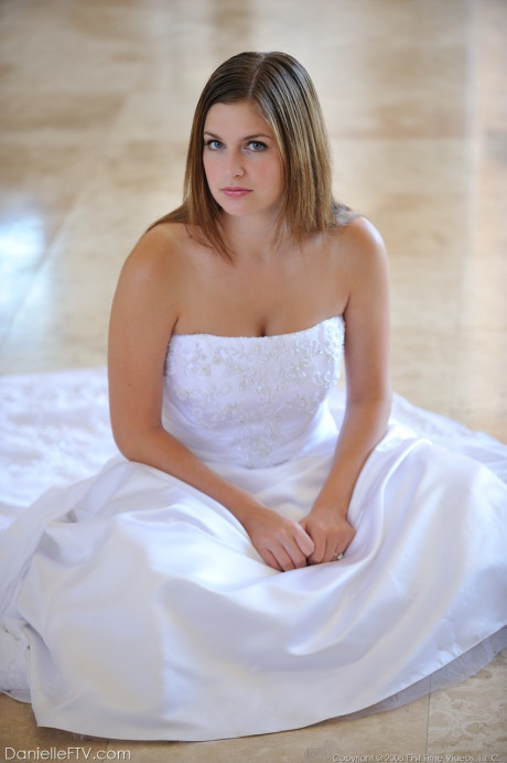 Busty glamorous amateur Danielle models wedding gown indoors & by the pool - #218940