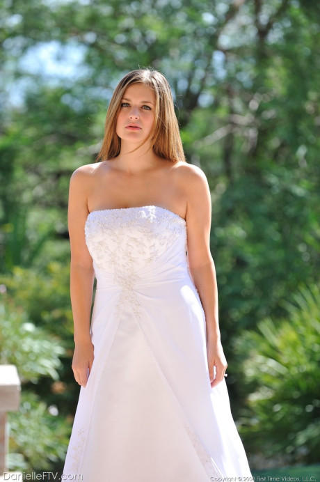 Busty glamorous amateur Danielle models wedding gown indoors & by the pool - #218941