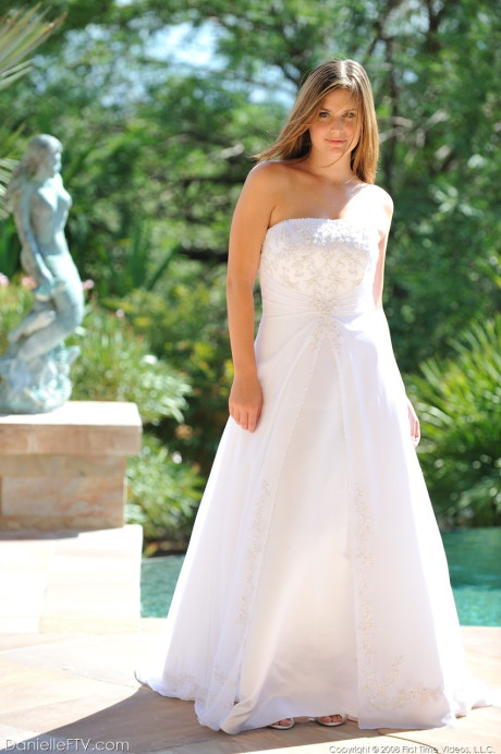 Busty glamorous amateur Danielle models wedding gown indoors & by the pool - #218942