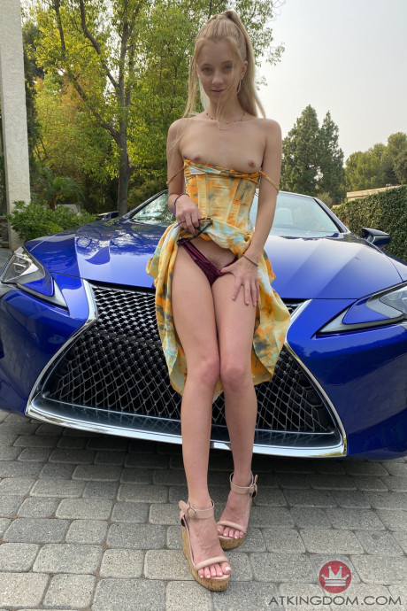 Tiny babe Riley Star shows her massive clit and spreads her butt in a convertible - #106417