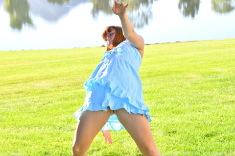 Glamour babe red hair toys her shaved pussy with a veggie and with her dildos - #195120