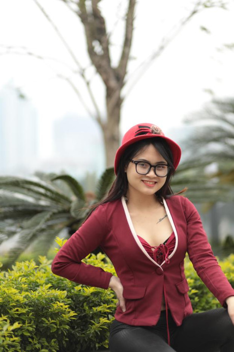 Skinny oriental babe Julia Myle posing in her stunning outfit outdoors