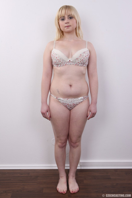 Plump blond slut GF lady removes her clothes until she's standing naked against a wall - #36609