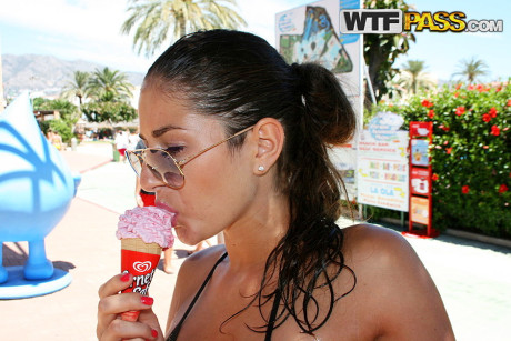 Amateur slut lady Nessa models a bikini in a pool before going undressed on a balcony - #146153