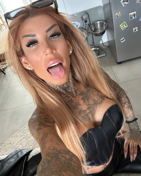 Tattooed amateur teases with her gorgeous curves in hot outfits - #56172