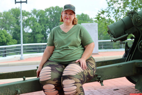 Obese amateur Goddess Pear models for a SFW shoot on an artillery gun in camo - #119756