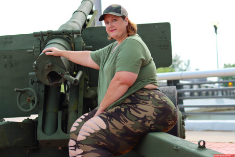 Obese amateur Goddess Pear models for a SFW shoot on an artillery gun in camo - #119760