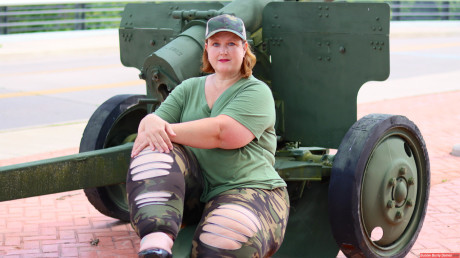 Obese amateur Goddess Pear models for a SFW shoot on an artillery gun in camo #6621