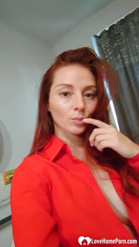 Pretty red hair shows off her big melons & her tattoos while taking nudes - #27087