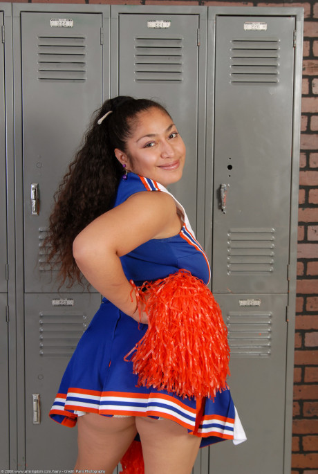 Thin curly haired cheerleader Reena shows her wide booty and bushy pussy - #70607