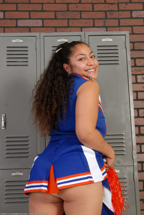 Thin curly haired cheerleader Reena shows her wide booty and bushy pussy - #70608