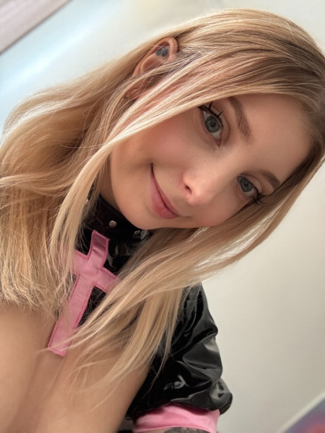 Pretty blonde teenie Lit1le Kitty shows her monstrous booty in sexy fetish wear