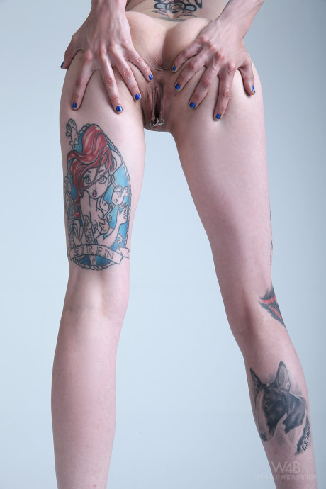 Teenie with blue hair exposes her slender body, massive melons and hot tattoos - #215145