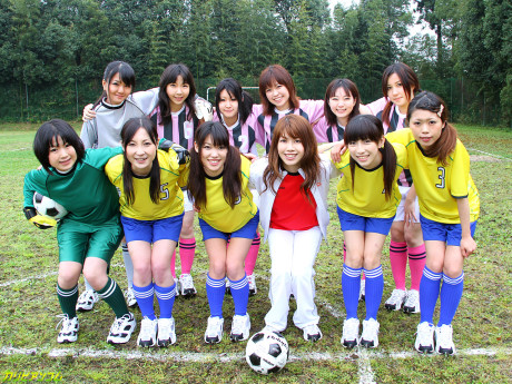 Oriental female football team watches as a teammate gets nailed by the referees - #42373