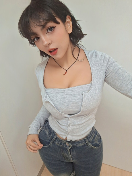 Charming brunette teenie Nerdy B changes her clothing while taking nude selfies - #30594