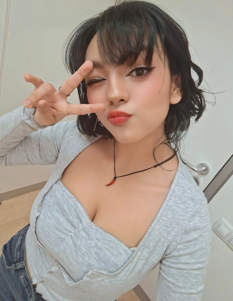 Charming brunette teenie Nerdy B changes her clothing while taking nude selfies - #30606