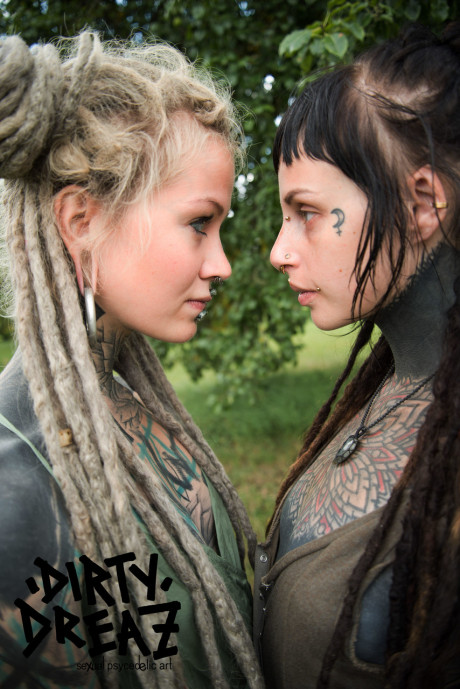 Alternative whores share a lesbian tongue kiss while outdoors - #10577
