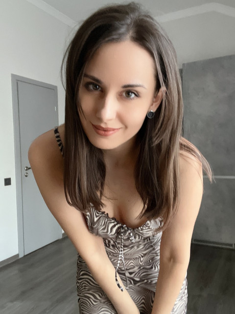 OnllyFans teenie Alina Berryy posing in her charming tight dress in a solo