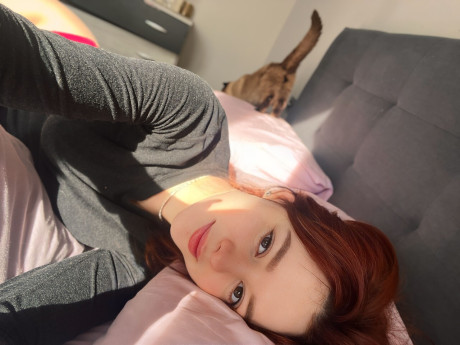 Sexy redhead Sofi Foxxxy shows her huge tits on a bed in a red thong - #217696