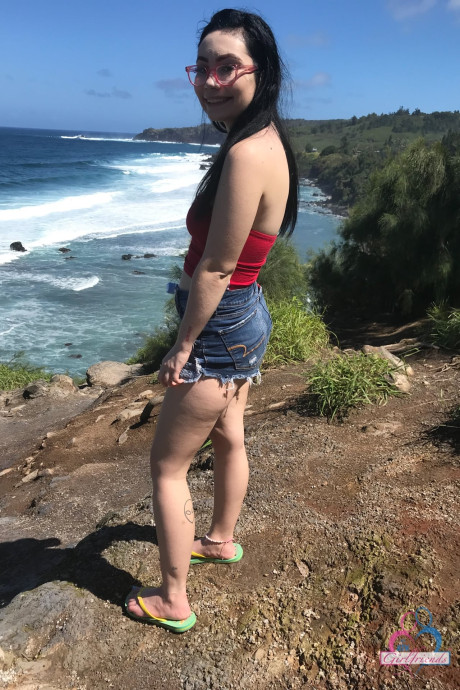 Sweet teen Lenna Lux takes non undressed poses while visiting a tropical location