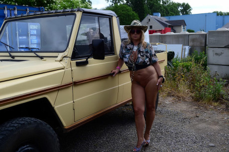 Mature blonde naked Chrissy gets naked in a military hat and sunglasses - #272035