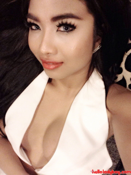 Attractive oriental t-girl Lee Ya flaunts her firm gigantic boobs and poses in a solo - #24690