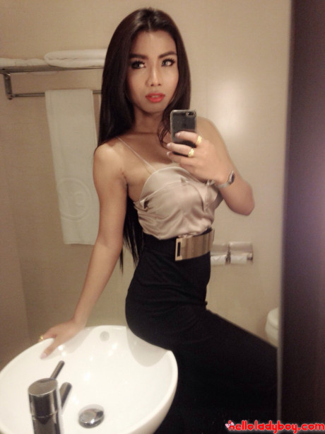 Attractive oriental t-girl Lee Ya flaunts her firm gigantic boobs and poses in a solo - #24691