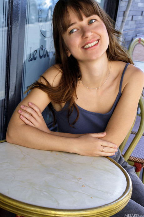 Fresh teenie brunette with an inviting smile reveals her trimmed bush on a bed - #295025