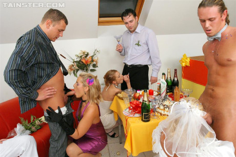 New bride dressed in her wedding dress plays water sport games at reception - #54979