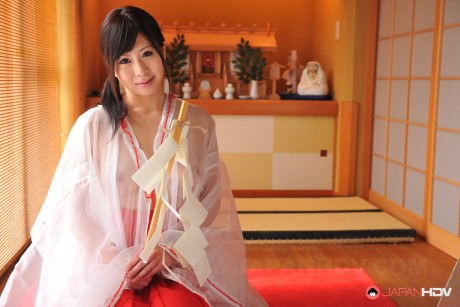 Japanese girl gf lady Yume Sorano holds a branch while showing her natural boobs - #269638