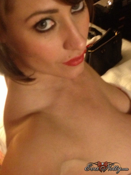 Kinky MILF Eva Notty shows cumshots on her fake boobs up close - #324605