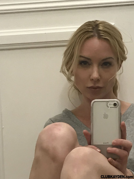 Beutiful blondy babe with sweet legs Kayden Kross flaunts her huge nips and tits - #58369