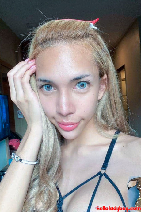 Blue-eyed asian t-girl shows off her alluring figure and poses provocatively - #56243