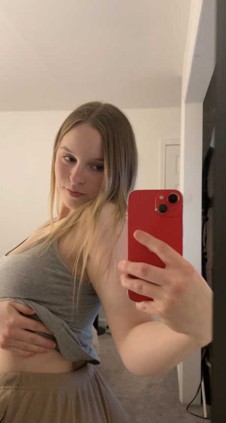 Amateur skank girl girl takes selfies in a mirror while wearing a thong and behind shorts - #299155