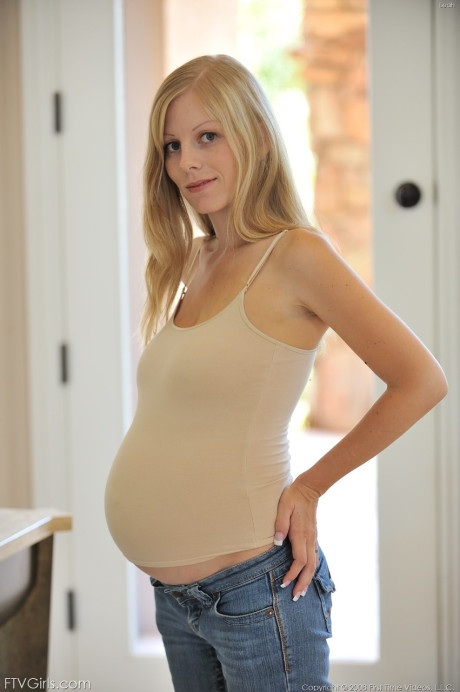 Pregnant blonde teenie Leah reveals her saggy tits and milks her big nipples - #295771