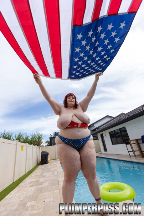 Redheaded BBW Asstyn Martyn goes bare-breasted & shows her massive natural titties outside - #318677