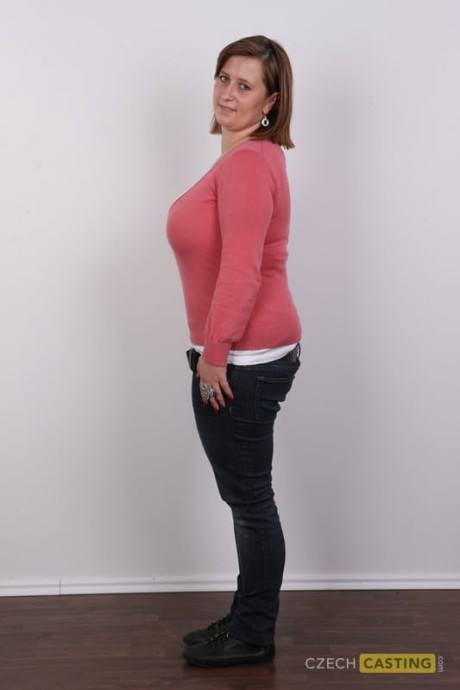 Thick mature amateur gets completely undressed in front of a white wall - #321567