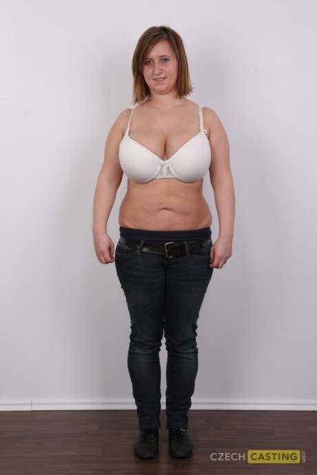 Thick mature amateur gets completely undressed in front of a white wall - #321571