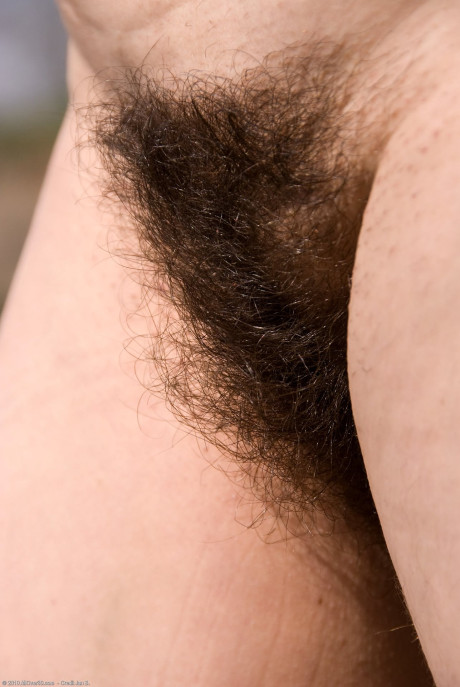 Wild MILF Sandra K strips fully undressed & shows off her hairy vagina outdoors - #316086