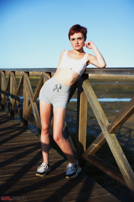 Solo lady gf girl with short red hair and freckles puffs on a smoke after getting wet - #311441
