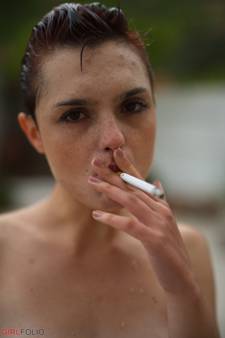 Solo lady gf girl with short red hair and freckles puffs on a smoke after getting wet - #311449