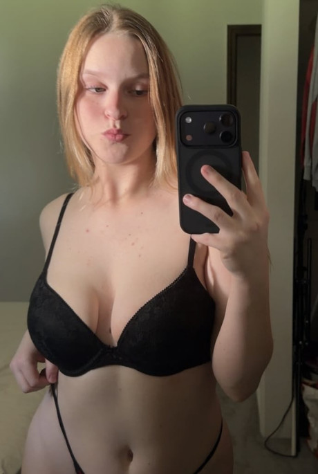 Blondy amateur takes selfies while going bare-breasted in a thong and nylon panties - #322864