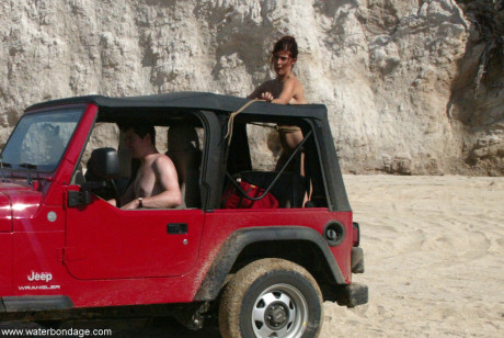 Attractive MILF with amazing titties Sasha Monet gets tied naked to a Jeep - #277316