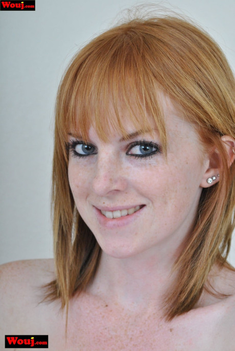 Thin ginger head WouJ drops her shirt sleeves to tease seductively on her bed - #306571