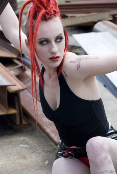 Punk slut GF lady with red hair poses naked in platform boots at industrial site - #63975